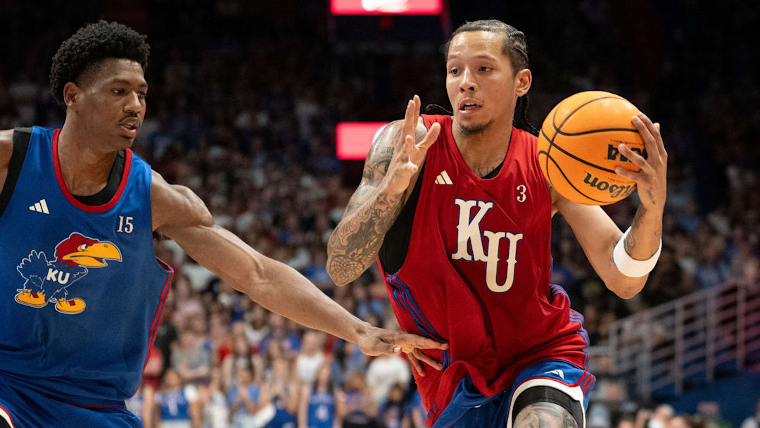 Kansas men's basketball's Tre White (3) drives to the basket during Late Night in the Phog, Friday, Oct. 17, 2025 at Allen Fieldhouse .