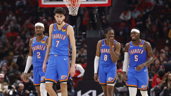 Oct 25, 2023; Chicago, Illinois, USA; Oklahoma City Thunder guard Shai Gilgeous-Alexander (2), forward Chet Holmgren (7), forward Jalen Williams (8), guard Luguentz Dort (5) and guard Josh Giddey (3) walk on the court during the second half of a basketball game against the Chicago Bulls at United Center. Mandatory Credit: Kamil Krzaczynski-USA TODAY Sports