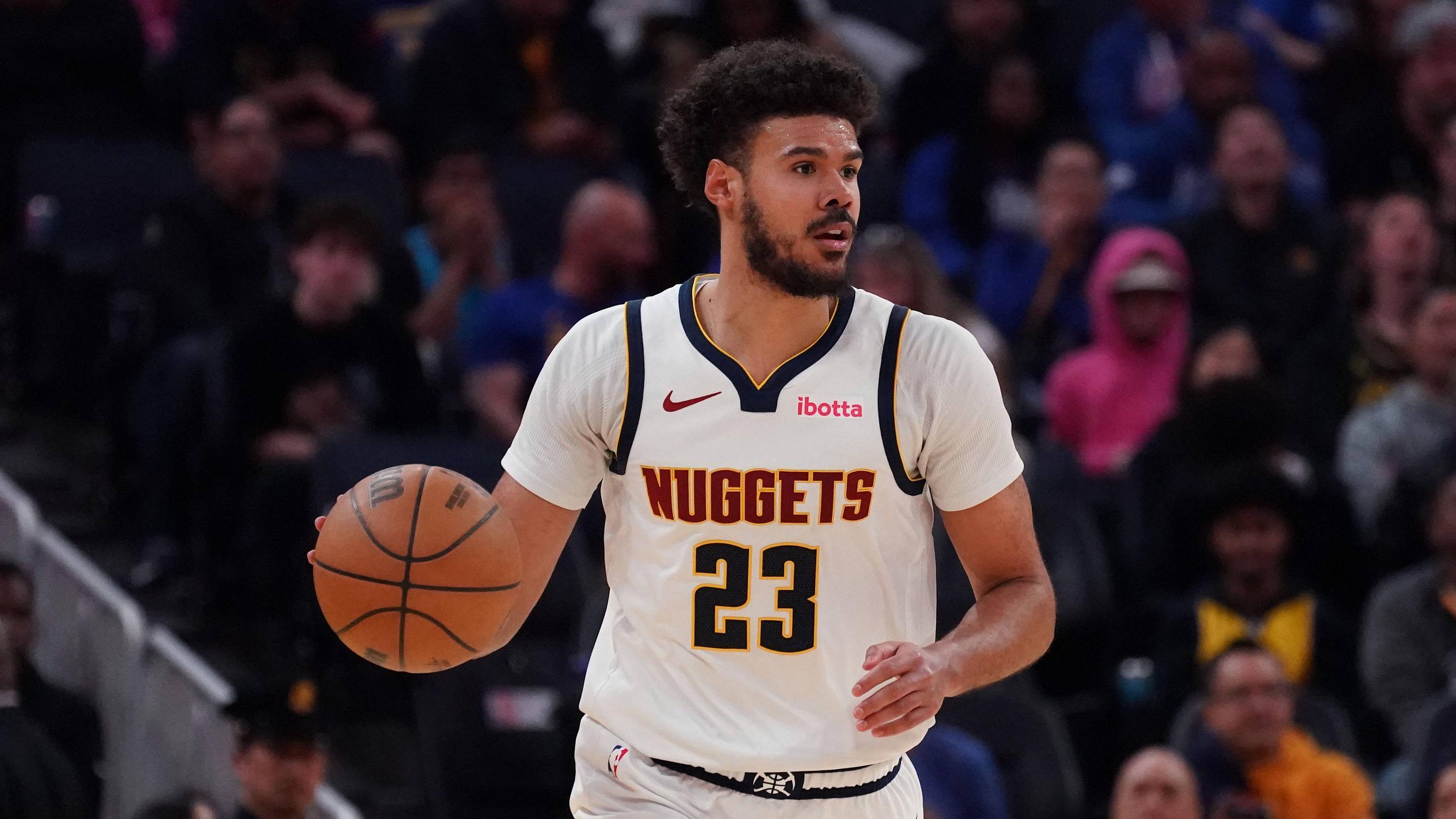Feb 22, 2026; San Francisco, California, USA; Denver Nuggets forward Cameron Johnson (23) dribbles upcourt against the Golden State Warriors in the third quarter at Chase Center. Mandatory Credit: David Gonzales-Imagn Images