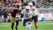 Nov 15, 2025; Chestnut Hill, Massachusetts, USA; Georgia Tech Yellow Jackets running back Malachi Hosley (0) runs the ball for a touchdown during the first half against the Boston College Eagles at Alumni Stadium. Mandatory Credit: Bob DeChiara-Imagn Images