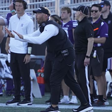 Aug 31, 2024; Evanston, Illinois, USA; Northwestern Wildcats head coach David Braun gestures to his team against the Miami (Oh) Redhawks during the second half at Lanny and Sharon Martin Stadium. Mandatory Credit: David Banks-Imagn Images
