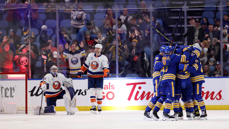 Feb 15, 2022; Buffalo, New York, USA;  Buffalo Sabres left wing Victor Olofsson (71) celebrates his