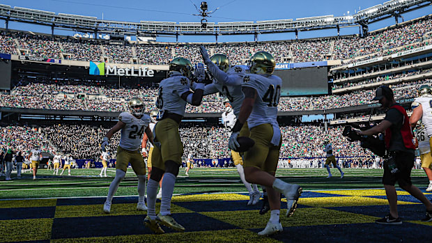 Notre Dame celebrates a fumble recovery for a touchdown against Nav
