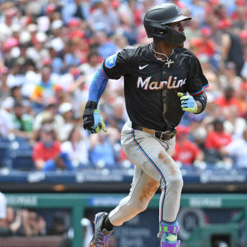 Jun 30, 2024; Philadelphia, Pennsylvania, USA; Miami Marlins outfielder Jazz Chisholm Jr. (2) watches his hits an RBI single against the Philadelphia Phillies during the fourth inning at Citizens Bank Park. 