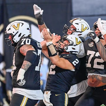 Vanderbilt quarterback Diego Pavia (2) celebrates at touchdown with teammates during the fourth quarter against Auburn at FirstBank Stadium in Nashville, Tenn., Saturday, Nov. 8, 2025.