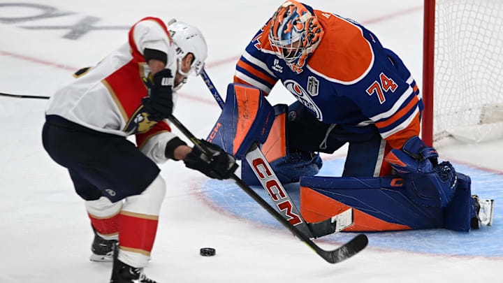 Jun 6, 2025; Edmonton, Alberta, CAN; Florida Panthers center Brad Marchand (63) scores the game winning goal against Edmonton Oilers goaltender Stuart Skinner (74) during double overtime in game two of the 2025 Stanley Cup Final at Rogers Place.