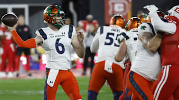 Feb 19, 2023; Washington, DC, USA; Seattle Sea Dragons quarterback Ben DiNucci (6) passes the ball against the D.C. Defenders during the first quarter at Audi Field. Mandatory Credit: Geoff Burke-Imagn Images
