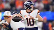 Dec 19, 2024; Inglewood, California, USA; Denver Broncos quarterback Bo Nix (10) throws against the Los Angeles Chargers during the first half at SoFi Stadium. 
