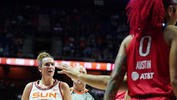 May 18, 2025; Uncasville, Connecticut, USA; Connecticut Sun guard Marina Mabrey (3) has words with Washington Mystics forward Shakira Austin (0) in the first half at Mohegan Sun Arena. Mandatory Credit: David Butler II-Imagn Images