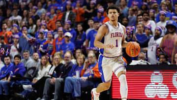 Dec 4, 2024; Gainesville, Florida, USA; Florida Gators guard Walter Clayton Jr. (1) dribbles the ball against the Virginia Cavaliers during the second half at Exactech Arena at the Stephen C. O'Connell Center. Mandatory Credit: Matt Pendleton-Imagn Images