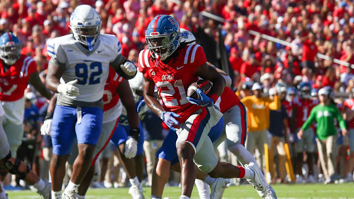 Sep 7, 2024; Oxford, Mississippi, USA; Mississippi Rebels running back Henry Parrish Jr. (21) runs the ball for a touchdown during the first half against the Middle Tennessee Blue Raiders at Vaught-Hemingway Stadium. Mandatory Credit: Petre Thomas-Imagn Images