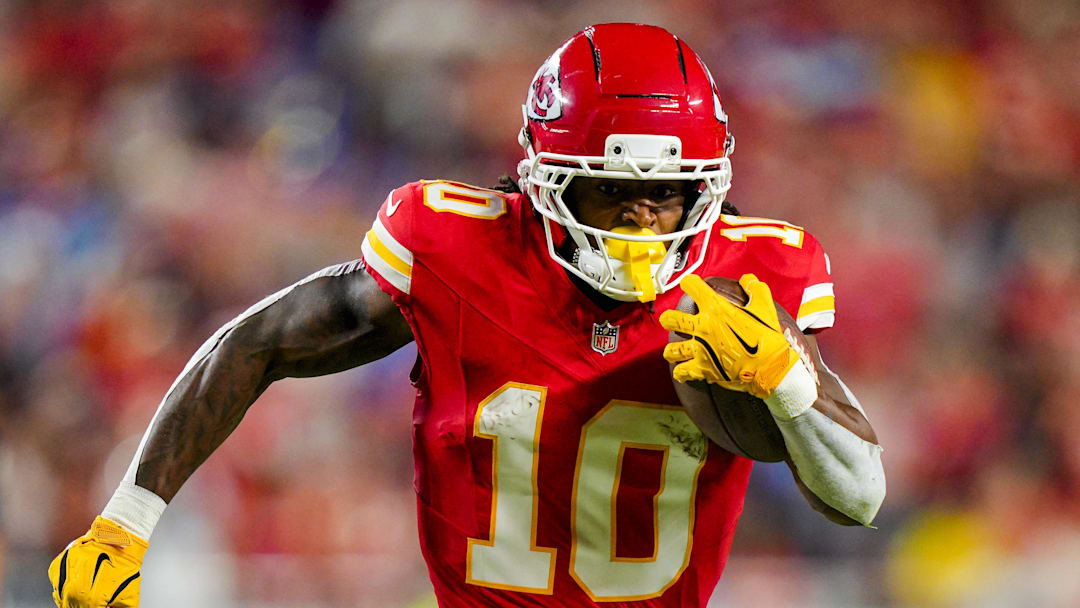 Oct 12, 2025; Kansas City, Missouri, USA; Kansas City Chiefs running back Isiah Pacheco (10) runs the ball during the first half against the Detroit Lions at GEHA Field at Arrowhead Stadium. Mandatory Credit: Jay Biggerstaff-Imagn Images