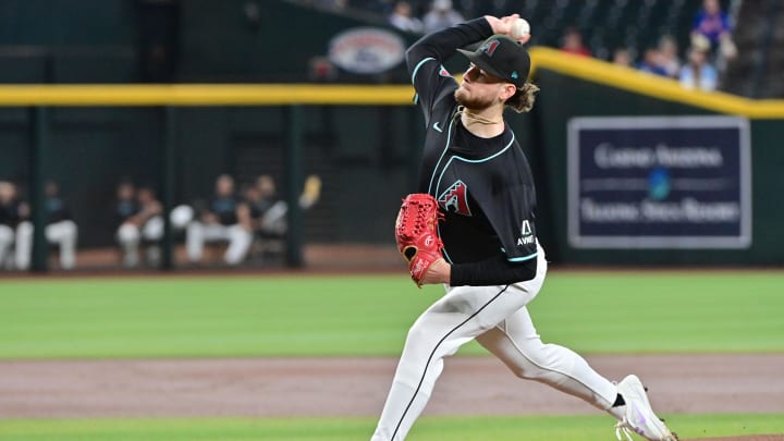 Aug 29, 2024; Phoenix, Arizona, USA;  Arizona Diamondbacks pitcher Ryne Nelson (19) throws in the first inning against the New York Mets at Chase Field. Mandatory Credit: Matt Kartozian-USA TODAY Sports