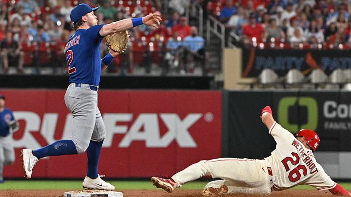 May 30, 2026; St. Louis, Missouri, USA; St. Louis Cardinals second baseman JJ Wetherholt (26) is forced out by Chicago Cubs second baseman Nico Hoerner (2) during the ninth inning at Busch Stadium. Mandatory Credit: Jeff Le-Imagn Images
