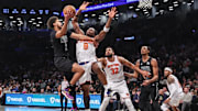 Jan 21, 2025; Brooklyn, New York, USA;  Brooklyn Nets forward Cameron Johnson (2) looks to drive past New York Knicks forward OG Anunoby (8) in the fourth quarter at Barclays Center. Mandatory Credit: Wendell Cruz-Imagn Images
