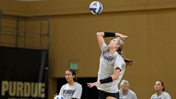 Purdue Boilermakers middle blocker Lizzie Carr (15) serves the ball Thursday, Aug. 8, 2024, during Purdue volleyball practice at Bimel Holloway Gymnasium in West Lafayette, Ind.