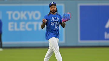 Oct 26, 2025; Los Angeles, CA, USA;  Los Angeles Dodgers center fielder Justin Dean (75) takes ground balls during World Series workouts prior to game three against the Toronto Blue Jays at Dodger Stadium. Mandatory Credit: Jayne Kamin-Oncea-Imagn Images