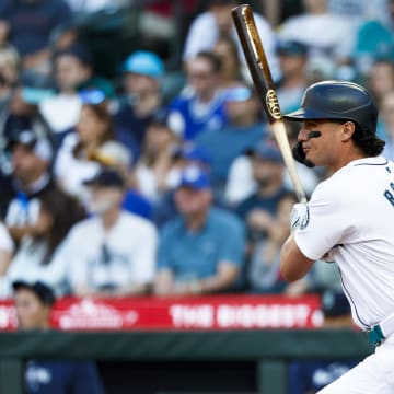 Seattle Mariners third baseman Josh Rojas hits a single against the Baltimore Orioles during the third inning of a game a game Tuesday at T-Mobile Park. 