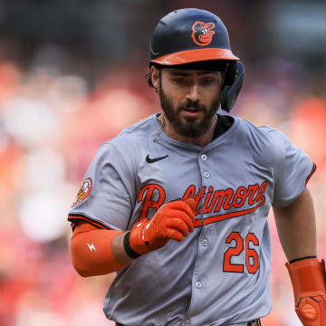 May 5, 2024; Cincinnati, Ohio, USA; Baltimore Orioles outfielder Ryan McKenna (26) scores on a RBI double hit by outfielder Colton Cowser (not pictured) in the ninth inning against the Cincinnati Reds at Great American Ball Park