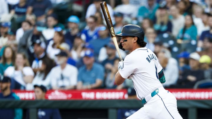Seattle Mariners third baseman Josh Rojas hits a single against the Baltimore Orioles during the third inning of a game a game Tuesday at T-Mobile Park. 