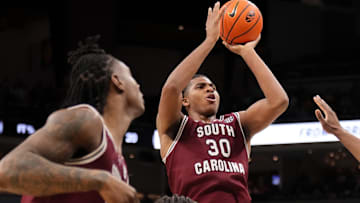Feb 25, 2025; Columbia, Missouri, USA; South Carolina Gamecocks forward Collin Murray-Boyles (30) shoots over Missouri Tigers guard Caleb Grill (31) during the second half at Mizzou Arena. Mandatory Credit: Denny Medley-Imagn Images