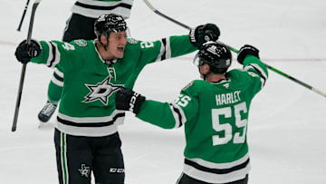 Apr 19, 2025; Dallas, Texas, USA; Dallas Stars center Roope Hintz (24) celebrates his goal with defenseman Thomas Harley (55) during the third period in game one of the first round of the 2025 Stanley Cup Playoffs against the Colorado Avalanche at American Airlines Center. Mandatory Credit: Raymond Carlin III-Imagn Images