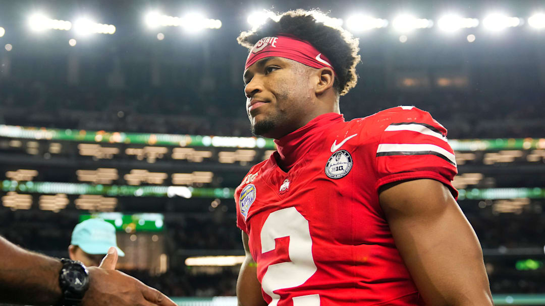 Ohio State Buckeyes defensive back Caleb Downs (2) leaves the field following the Cotton Bowl at AT&T Stadium in Arlington, Texas for the College Football Playoff quarterfinal game against the Miami Hurricanes on Dec. 31, 2025. Ohio State lost 24-14.