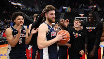 Nov 14, 2025; Inglewood, California, USA;  Arizona Wildcats guard Anthony Dell'Orso (3, middle) is congratulated by teammates after defeating the UCLA Bruins 69-65 at Intuit Dome. Mandatory Credit: Kiyoshi Mio-Imagn Images