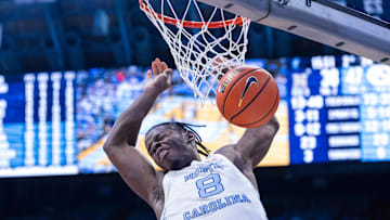 Nov 18, 2025; Chapel Hill, North Carolina, USA; North Carolina Tar Heels forward Caleb Wilson (8) dunks against the Navy Midshipmen during the second half at Dean E. Smith Center. 