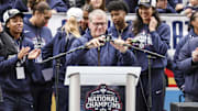 Apr 13, 2025; Hartford, CT, USA;   UConn Huskies head coach Geno Auriemma adjusts the microphones prior to his speech during the Final Four champions victory parade and rally outside of the XL Center in Hartford, CT. Mandatory Credit: Scott Rausenberger-Imagn Images