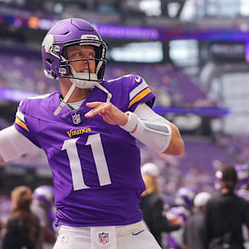 Aug 9, 2025; Minneapolis, Minnesota, USA; Minnesota Vikings quarterback Brett Rypien (11)warms up before the game against the Houston Texans at U.S. Bank Stadium.