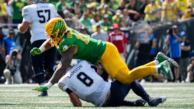 matayo uiagalelei oregon ducks nfl draft los angeles chargers college football big ten dante moore dan lanning kenyon sadiq