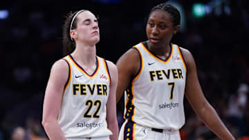 Jul 15, 2025; Boston, Massachusetts, USA; Indiana Fever guard Caitlin Clark (22) reacts with a possible injury after a play against the Connecticut Sun in the second half at TD Garden. Mandatory Credit: David Butler II-Imagn Images