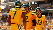 Oct 4, 2025; Waco, Texas, USA;  Baylor Bears running back Bryson Washington (7) celebrates with offensive lineman Coleton Price (72) and quarterback 
Sawyer Robertson (13) after scoring a touchdown against the Kansas State Wildcats during the second half at McLane Stadium. Mandatory Credit: Chris Jones-Imagn Images