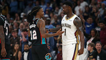 Oct 22, 2025; Memphis, Tennessee, USA; Memphis Grizzlies guard Ja Morant and New Orleans Pelicans forward Zion Williamson talk during the fourth quarter at FedExForum