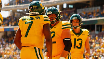 Oct 4, 2025; Waco, Texas, USA;  Baylor Bears running back Bryson Washington (7) celebrates with offensive lineman Coleton Price (72) and quarterback 
Sawyer Robertson (13) after scoring a touchdown against the Kansas State Wildcats during the second half at McLane Stadium. Mandatory Credit: Chris Jones-Imagn Images