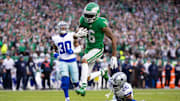 Philadelphia Eagles wide receiver DeVonta Smith (6) runs past Dallas Cowboys cornerback DaRon Bland (26) for a touchdown after a catch during the fourth quarter at Lincoln Financial Field. 