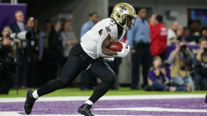 Jan 14, 2018; Minneapolis, MN, USA; New Orleans Saints running back Alvin Kamara (41) returns a kick in the fourth quarter against the Minnesota Vikings at U.S. Bank Stadium. Mandatory Credit: Brad Rempel-USA TODAY Sports