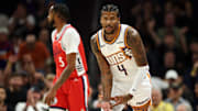 Nov 6, 2025; Phoenix, Arizona, USA; Phoenix Suns guard Jalen Green (4) celebrates a three point shot against the Los Angeles Clippers in the first half at the Mortgage Matchup Center. Mandatory Credit: Mark J. Rebilas-Imagn Images
