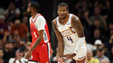 Nov 6, 2025; Phoenix, Arizona, USA; Phoenix Suns guard Jalen Green (4) celebrates a three point shot against the Los Angeles Clippers in the first half at the Mortgage Matchup Center. Mandatory Credit: Mark J. Rebilas-Imagn Images