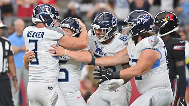 Tennessee Titans kicker Joey Slye (6) celebrates making a 29-yard field goal with holder Johnny Hekker (3) and teammates.