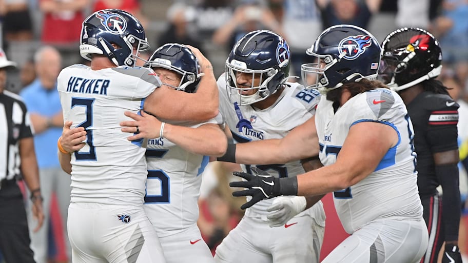 Tennessee Titans kicker Joey Slye (6) celebrates making a 29-yard field goal with holder Johnny Hekker (3) and teammates.