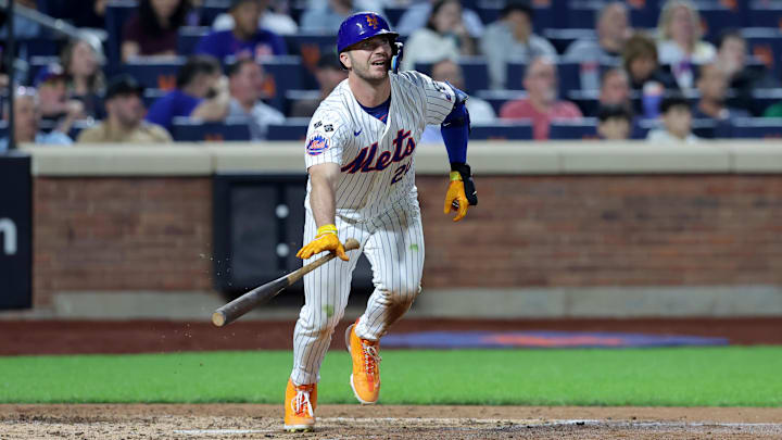 Sep 17, 2024; New York City, New York, USA; New York Mets first baseman Pete Alonso (20) follows through on a double against the Washington Nationals during the fifth inning at Citi Field. Mandatory Credit: Brad Penner-Imagn Images