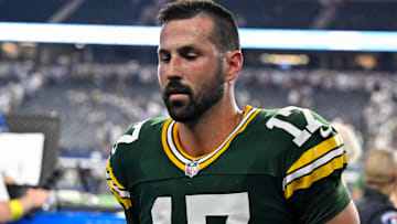 Green Bay Packers place kicker Brandon McManus (17) walks off the field after he kicks the game-tying field goal in overtime during the game between the Dallas Cowboys and the Green Bay Packers at AT&T Stadium.