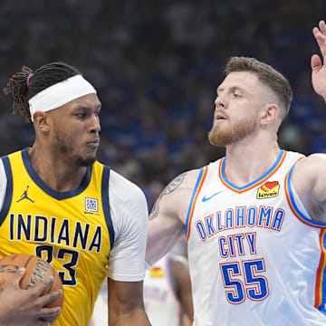 Jun 16, 2025; Oklahoma City, Oklahoma, USA; Indiana Pacers center Myles Turner (33) drives to the basket against Oklahoma City Thunder center Isaiah Hartenstein (55) during the second quarter of game five of the 2025 NBA Finals at Paycom Center. Mandatory Credit: Kyle Terada-Imagn Images