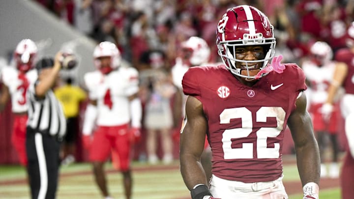 Aug 31, 2024; Tuscaloosa, Alabama, USA;  Alabama Crimson Tide running back Justice Haynes (22) reacts after scoring on an 85 yard run against the Western Kentucky Hilltoppers at Bryant-Denny Stadium. Mandatory Credit: Gary Cosby Jr.-Imagn Images