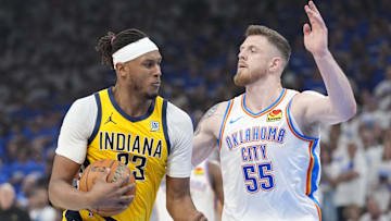 Jun 16, 2025; Oklahoma City, Oklahoma, USA; Indiana Pacers center Myles Turner (33) drives to the basket against Oklahoma City Thunder center Isaiah Hartenstein (55) during the second quarter of game five of the 2025 NBA Finals at Paycom Center. Mandatory Credit: Kyle Terada-Imagn Images