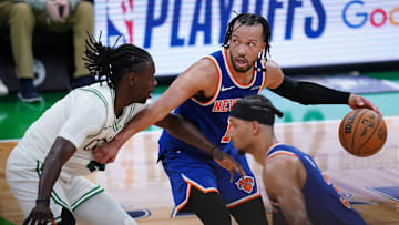 May 5, 2025; Boston, Massachusetts, USA; New York Knicks guard Jalen Brunson (11) moves the ball against Boston Celtics guard Jrue Holiday (4) in overtime during game one of the second round for the 2025 NBA Playoffs at TD Garden. Mandatory Credit: David Butler II-Imagn Images
