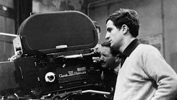 Director Francois Truffaut Beside Movie Camera