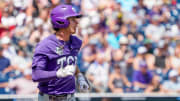 Jun 18, 2023; Omaha, NE, USA;  TCU Horned Frogs shortstop Anthony Silva (5) runs to first after hitting a single against the Virginia Cavaliers during the sixth inning at Charles Schwab Field Omaha. Mandatory Credit: Dylan Widger-USA TODAY Sports
